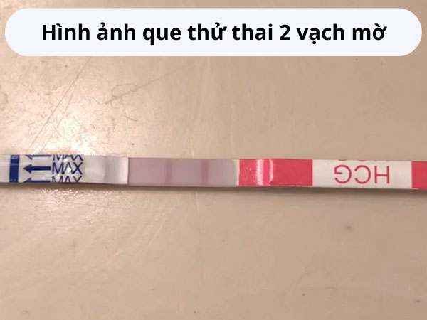 hinh-anh-que-thu-thai-2-vach-mo-tu-chup Hình ảnh que thử thai 2 vạch mờ tự chụp